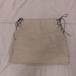 Checked black and white ribbon up sides skirt